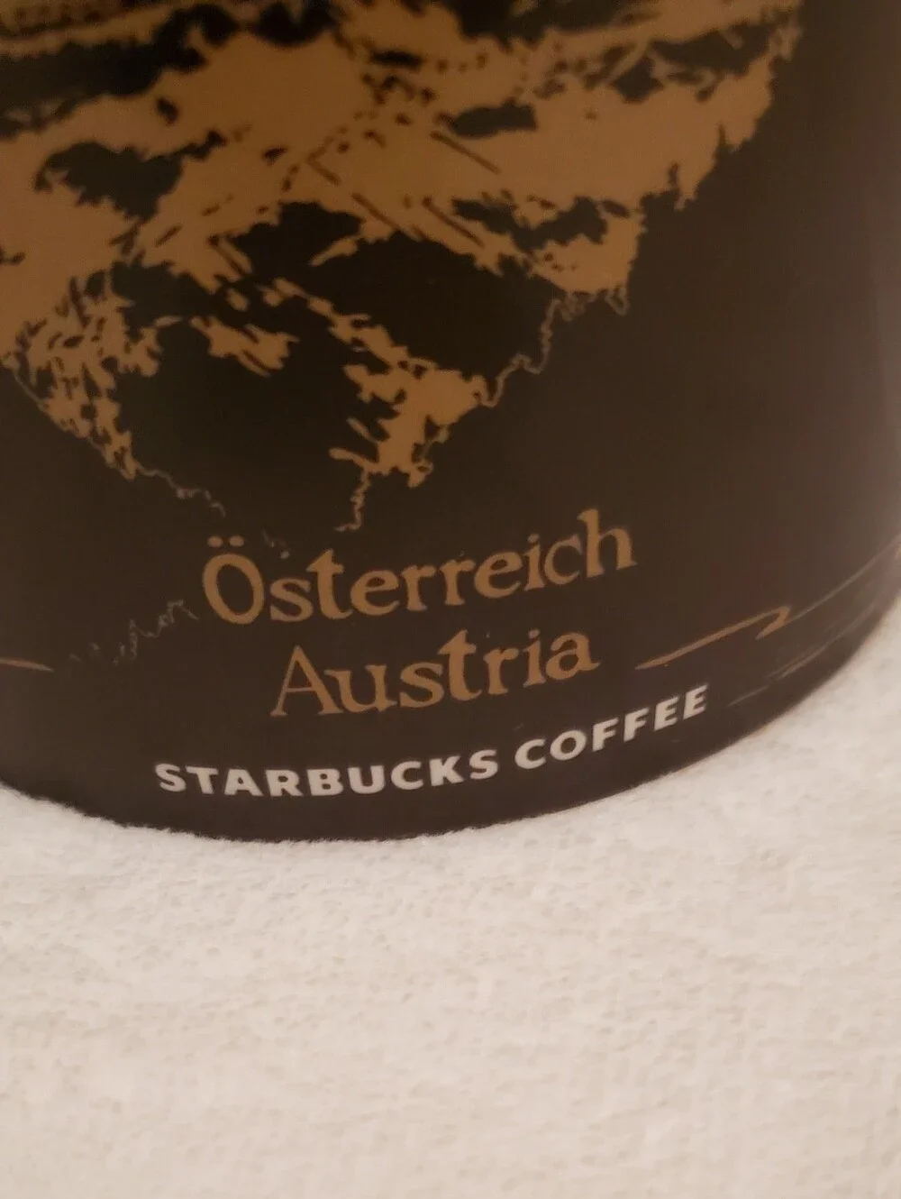 Starbucks Austria Souvenir Mug in Cream & Brown with Tan Hat Artwork